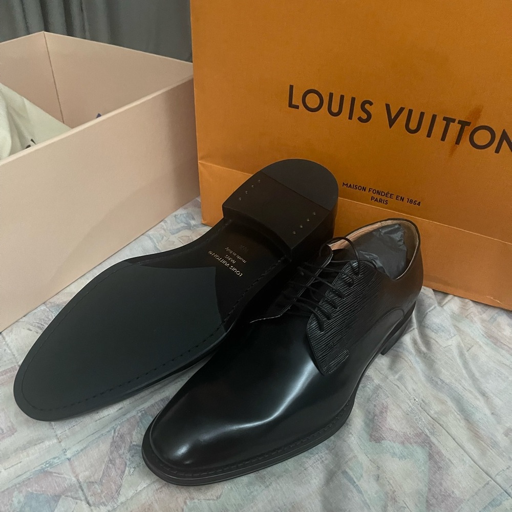 Louis Vutton dress shoes (never worn with receipt)